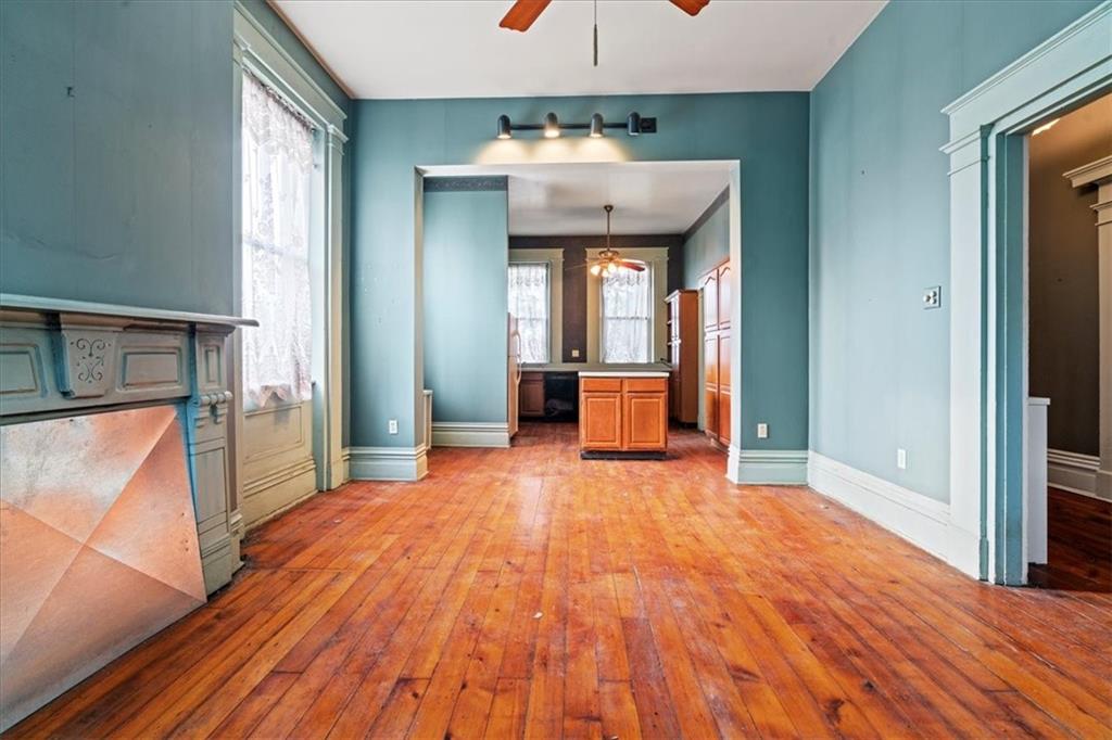 1947 South 18th Street Pittsburgh, PA 15203 - Photo 16 of 48 a view of an empty room with wooden floor and a window