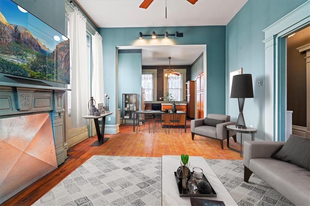 1947 South 18th Street Pittsburgh, PA 15203 - Photo 17 of 48 a living room with furniture and a fireplace