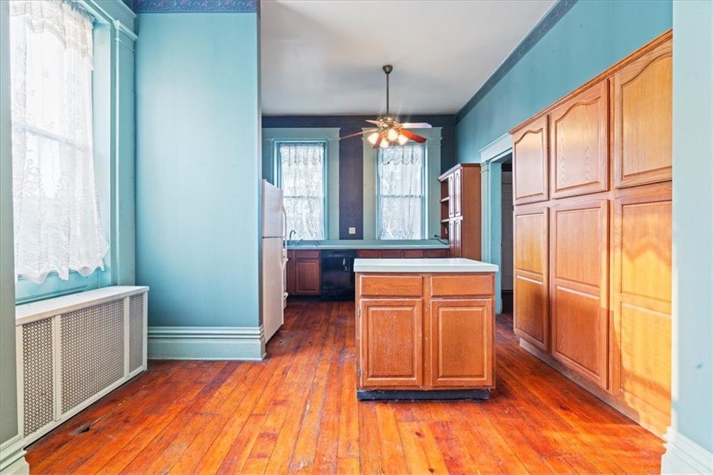 1947 South 18th Street Pittsburgh, PA 15203 - Photo 19 of 48 a room with window and wooden floor