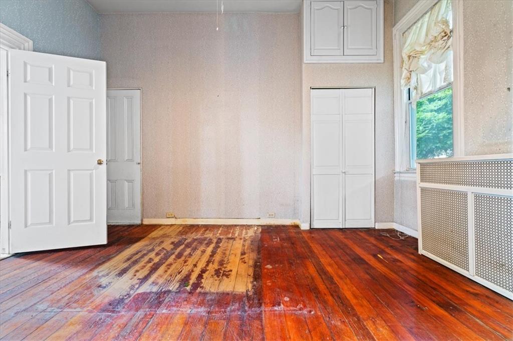 1947 South 18th Street Pittsburgh, PA 15203 - Photo 25 of 48 a view of a room with wooden floor and cabinet