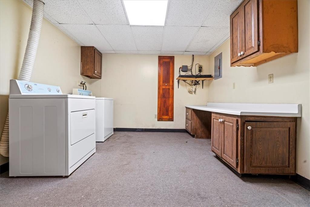1947 South 18th Street Pittsburgh, PA 15203 - Photo 33 of 48 a kitchen with a sink stove and cabinets