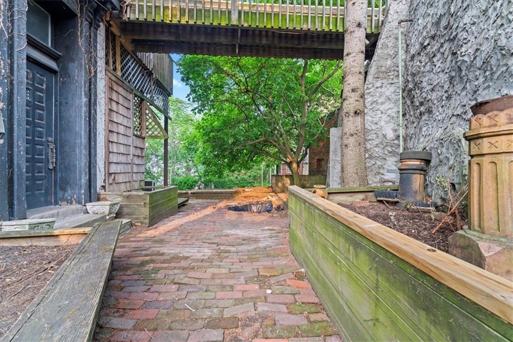 1947 South 18th Street Pittsburgh, PA 15203 - Photo 37 of 48 a view of a backyard with sitting area