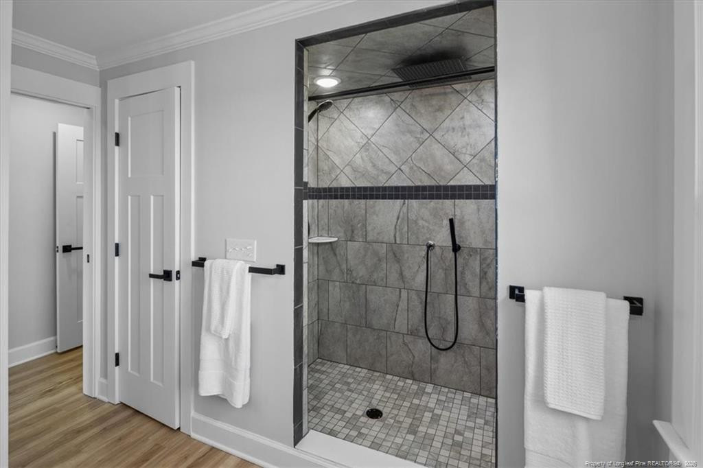 146 Union Church Road Carthage, NC 28327 - Photo 12 of 19 a bathroom with a glass shower door