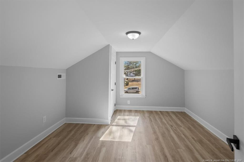 146 Union Church Road Carthage, NC 28327 - Photo 15 of 19 wooden floor in an empty room with a window