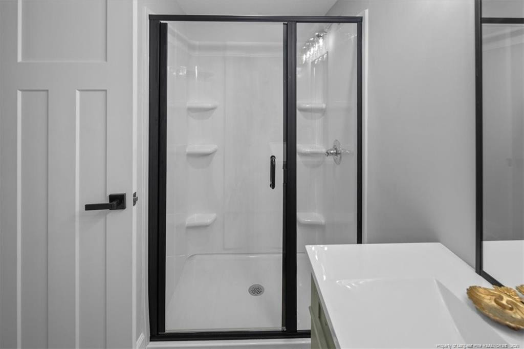 146 Union Church Road Carthage, NC 28327 - Photo 17 of 19 a bathroom with a bathtub and shower