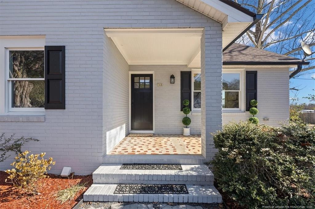 146 Union Church Road Carthage, NC 28327 - Photo 2 of 19 front view of a house with a rug