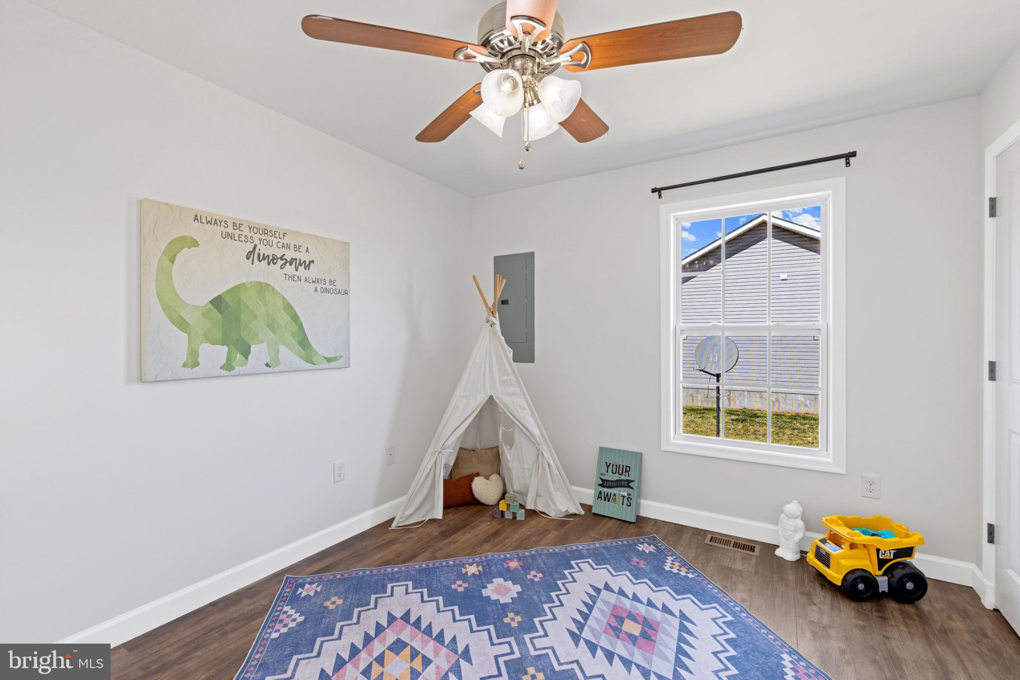 1523 Bowie Road Colonial Beach, VA 22443 - Photo 17 of 34 a bedroom with a bed and a window