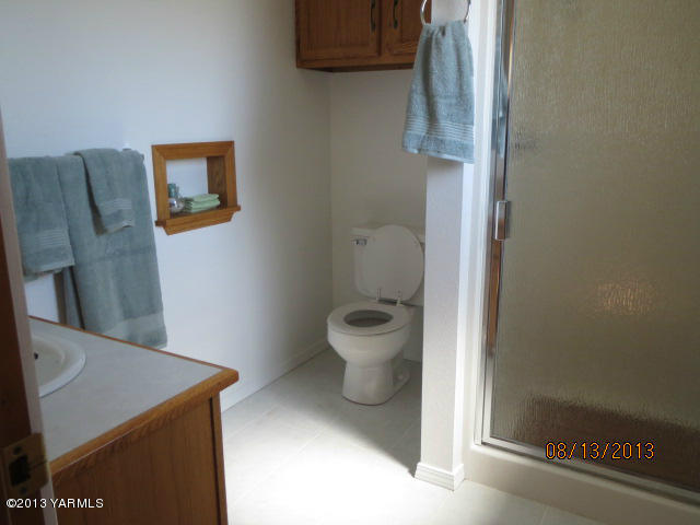 3330 Rosenkranz Road Tieton, WA 98947 - Photo 14 of 15 a bathroom with a toilet and a sink