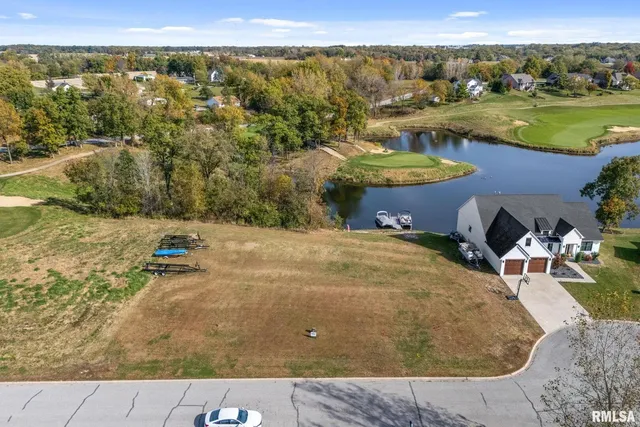 a view of a swimming pool with an ocean view