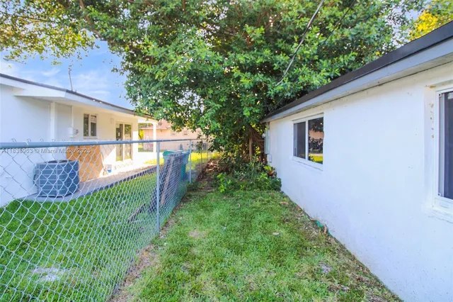 a view of a house with swimming pool