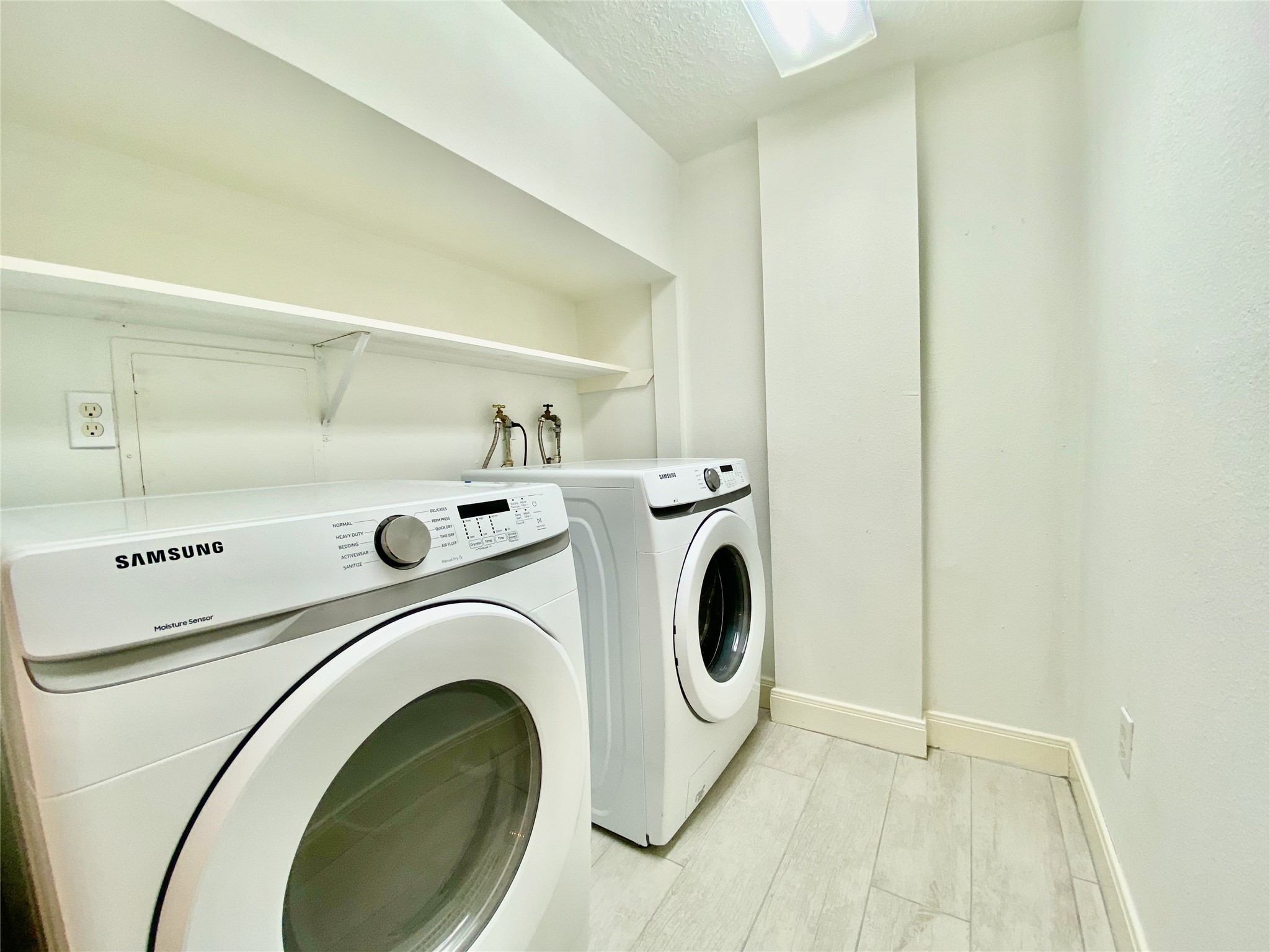 1259 Blalock Road Houston, TX 77055 - Photo 17 of 41 a utility room with dryer and washer