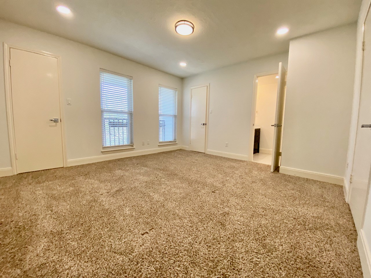 1259 Blalock Road Houston, TX 77055 - Photo 20 of 41 a view of an empty room with a window
