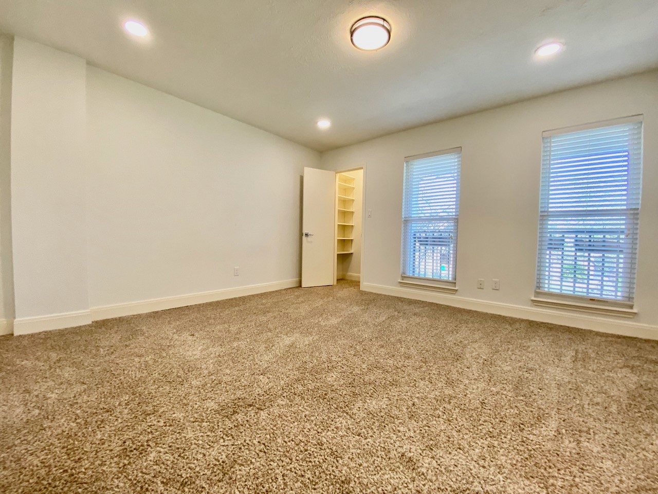 1259 Blalock Road Houston, TX 77055 - Photo 21 of 41 an empty room with windows
