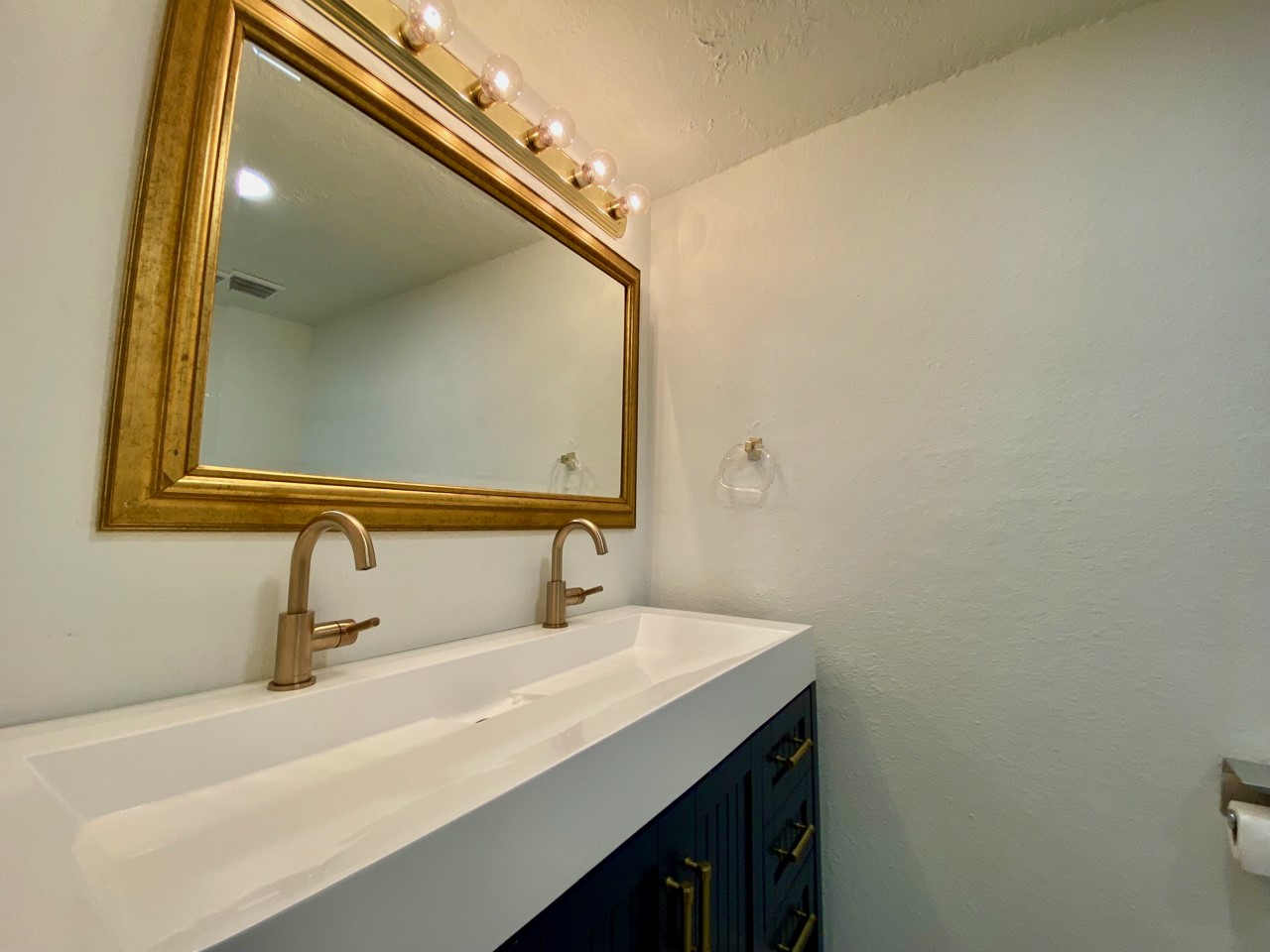 1259 Blalock Road Houston, TX 77055 - Photo 22 of 41 a bathroom with a sink and a mirror