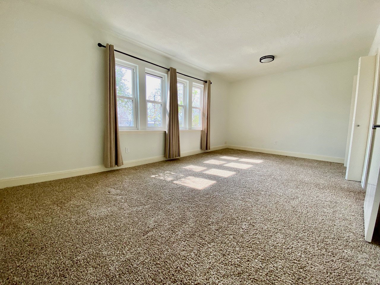 1259 Blalock Road Houston, TX 77055 - Photo 25 of 41 a view of an empty room with a window