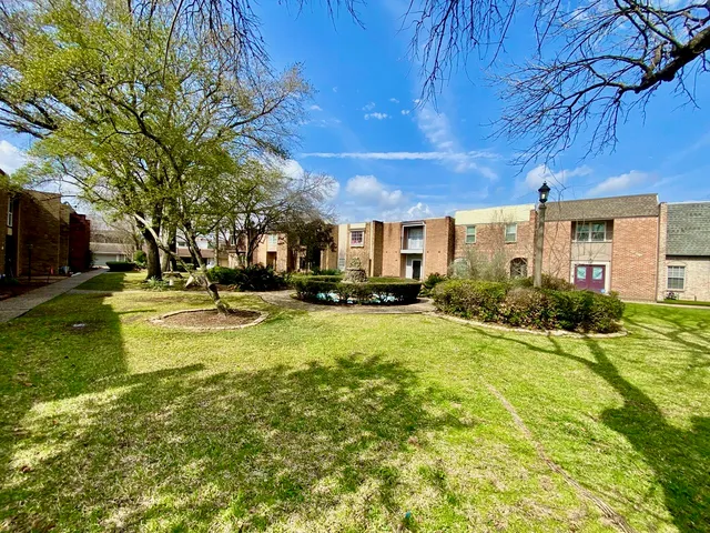 a view of a house with swimming pool