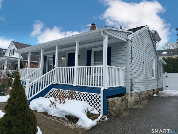 front view of a house with a deck