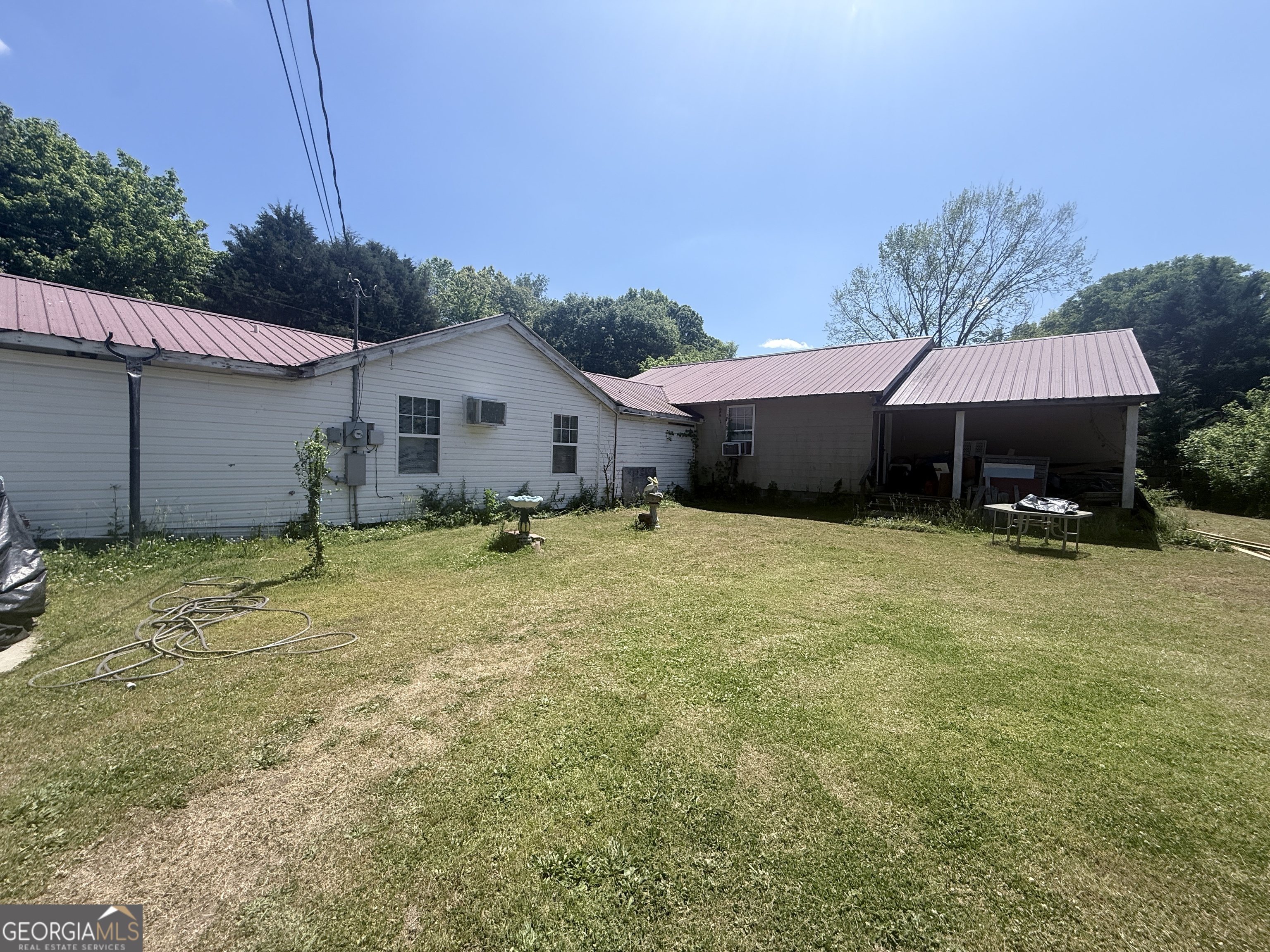 1072 Mountain View Road Trion, GA 30753 - Photo 20 of 29 a house with swimming pool in front of it