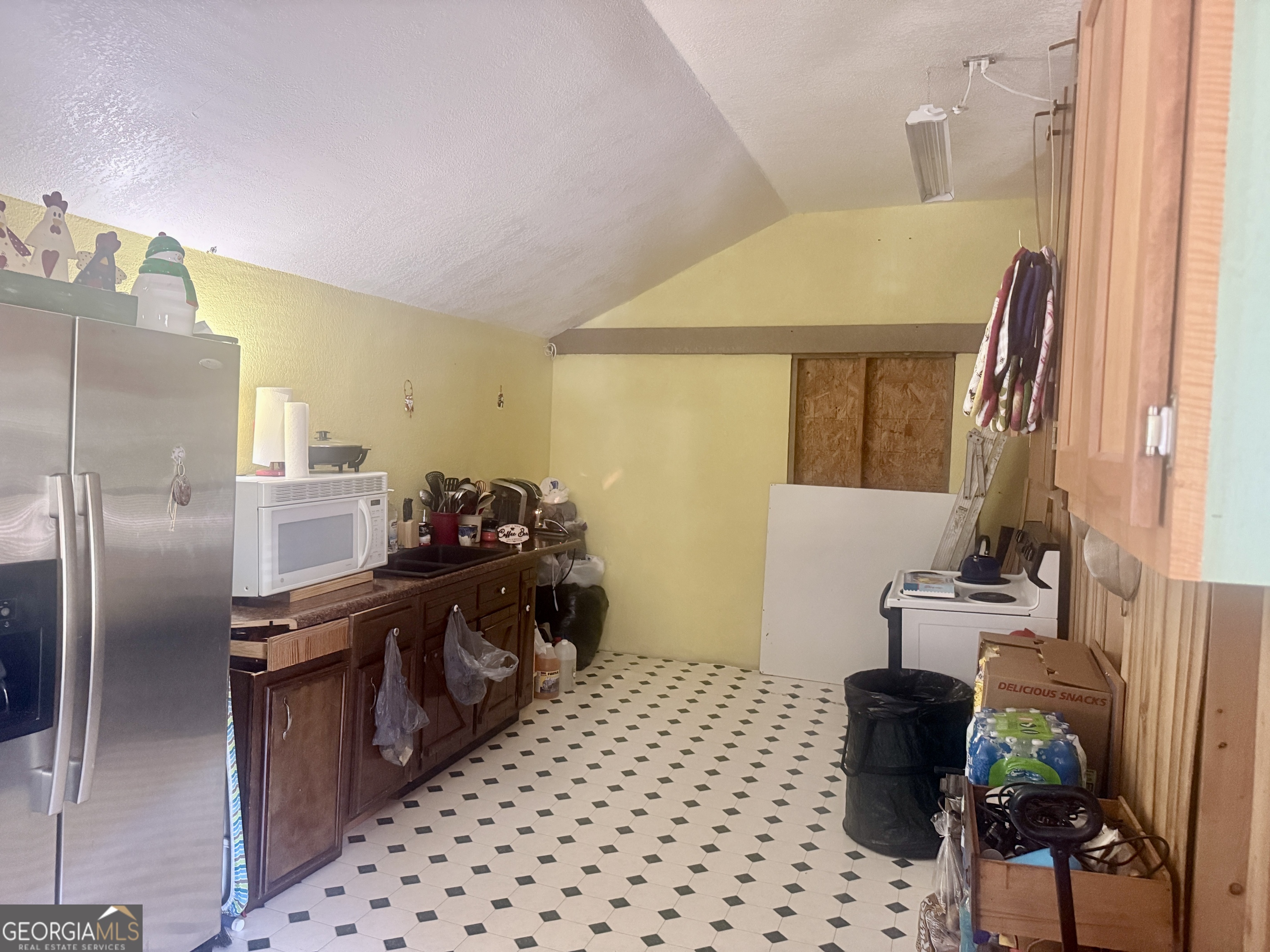 1072 Mountain View Road Trion, GA 30753 - Photo 26 of 29 a kitchen with a sink appliances and cabinets