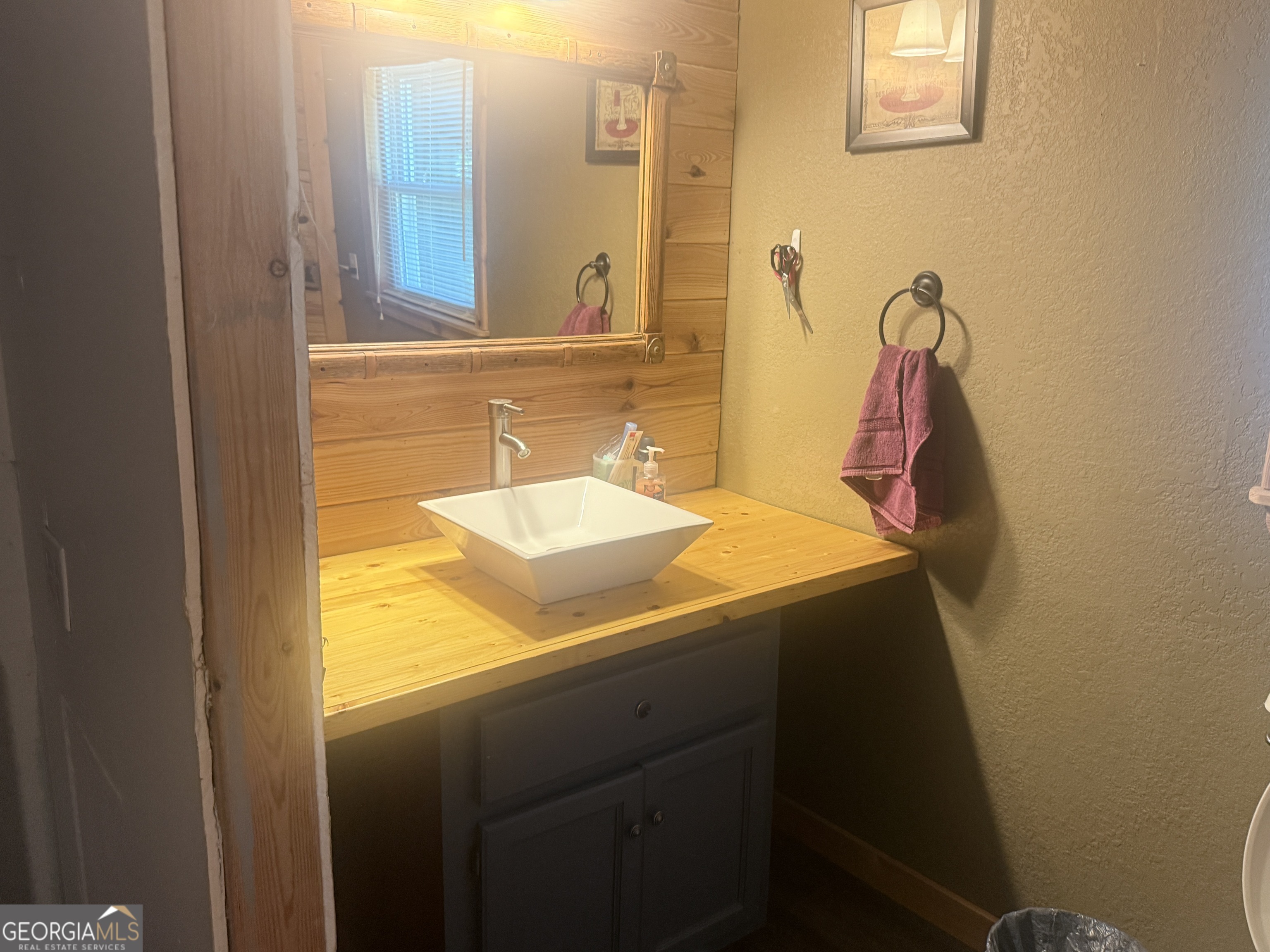 1072 Mountain View Road Trion, GA 30753 - Photo 7 of 29 a bathroom with a sink and a mirror