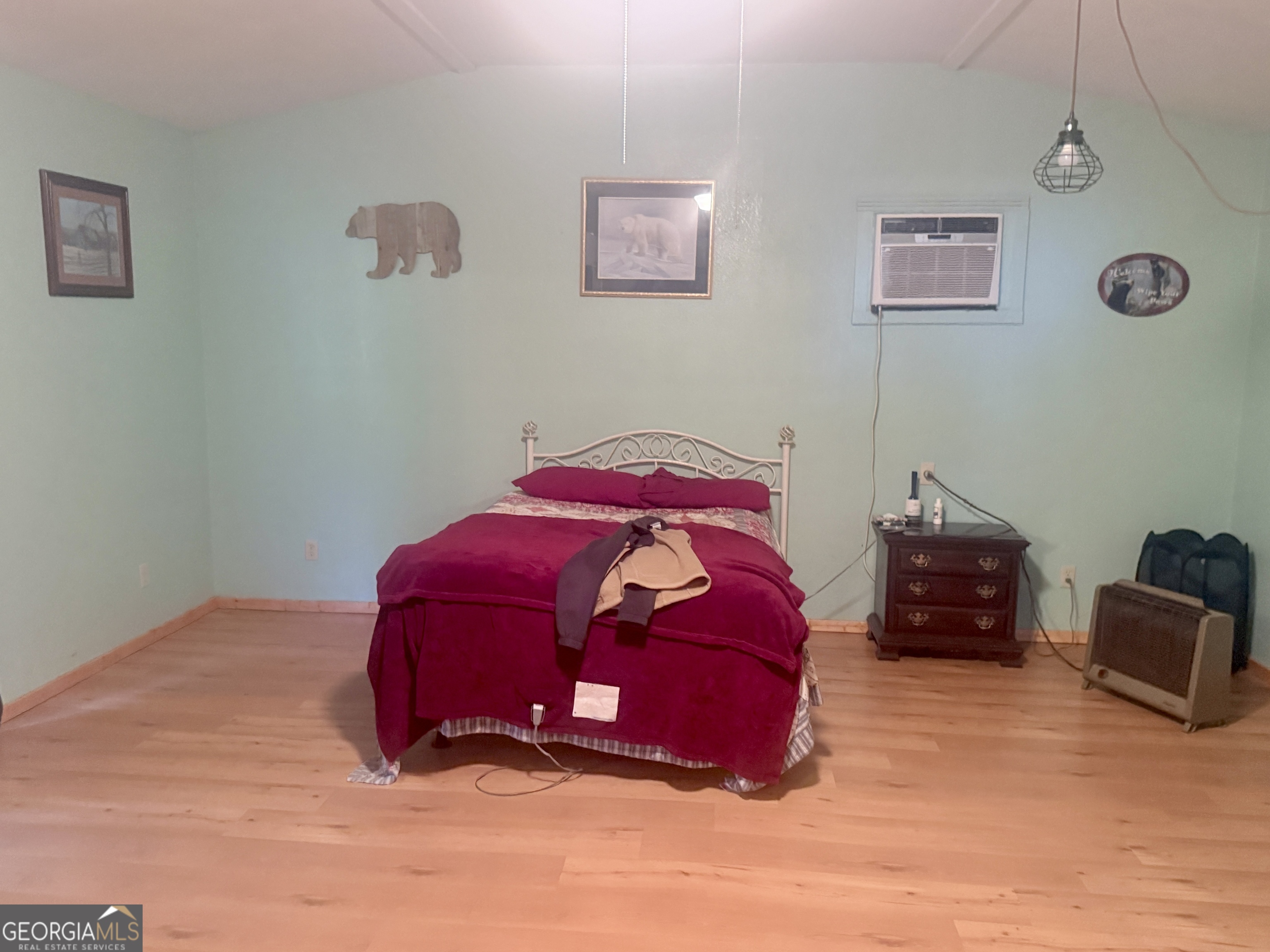 1072 Mountain View Road Trion, GA 30753 - Photo 10 of 29 a bedroom with a bed and a chair