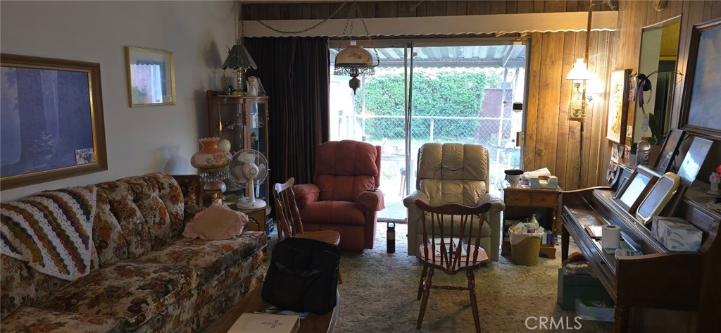 11826 Studebaker Road Norwalk, CA 90650 - Photo 13 of 15 a living room with furniture and a window