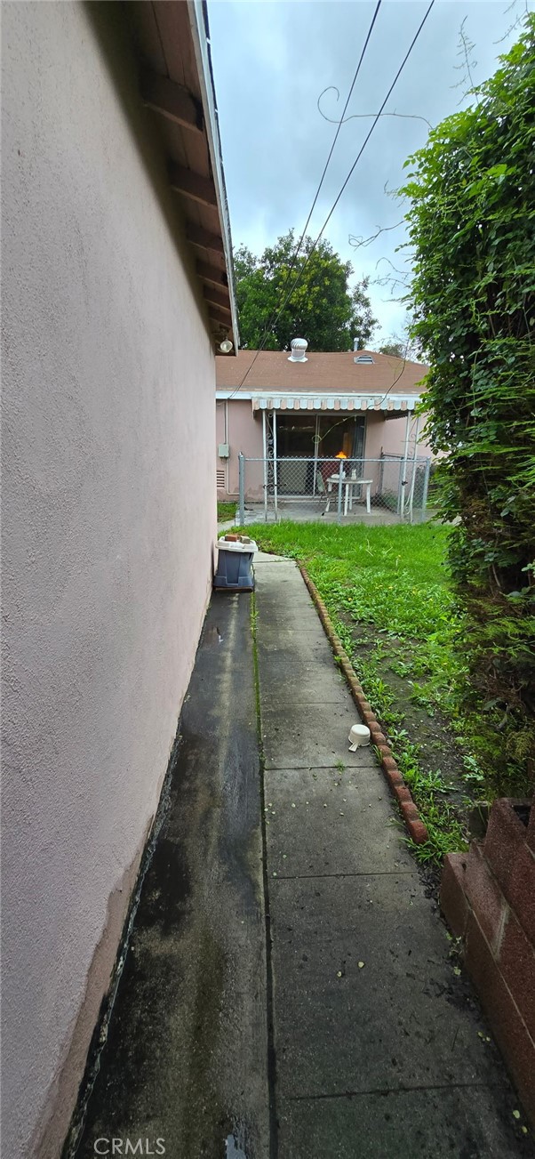 11826 Studebaker Road Norwalk, CA 90650 - Photo 2 of 15 a view of house with a yard