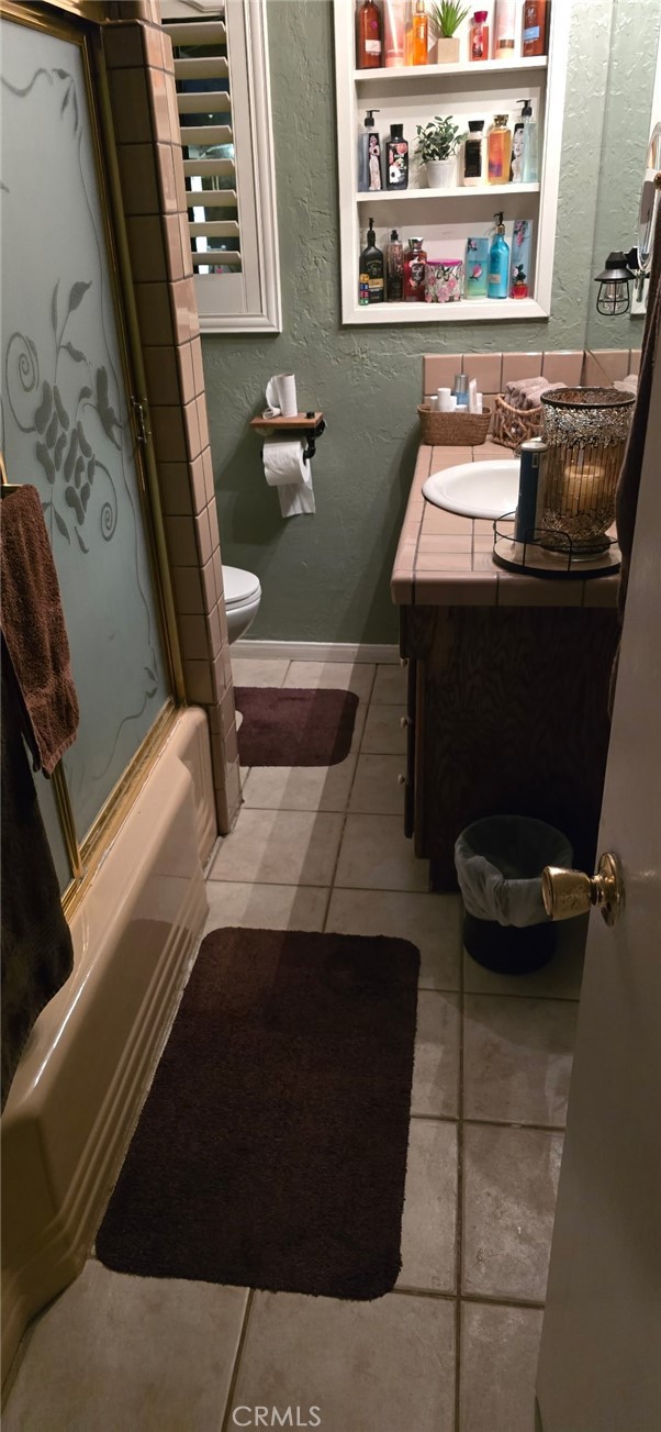 11826 Studebaker Road Norwalk, CA 90650 - Photo 8 of 15 a bathroom with a sink and a mirror