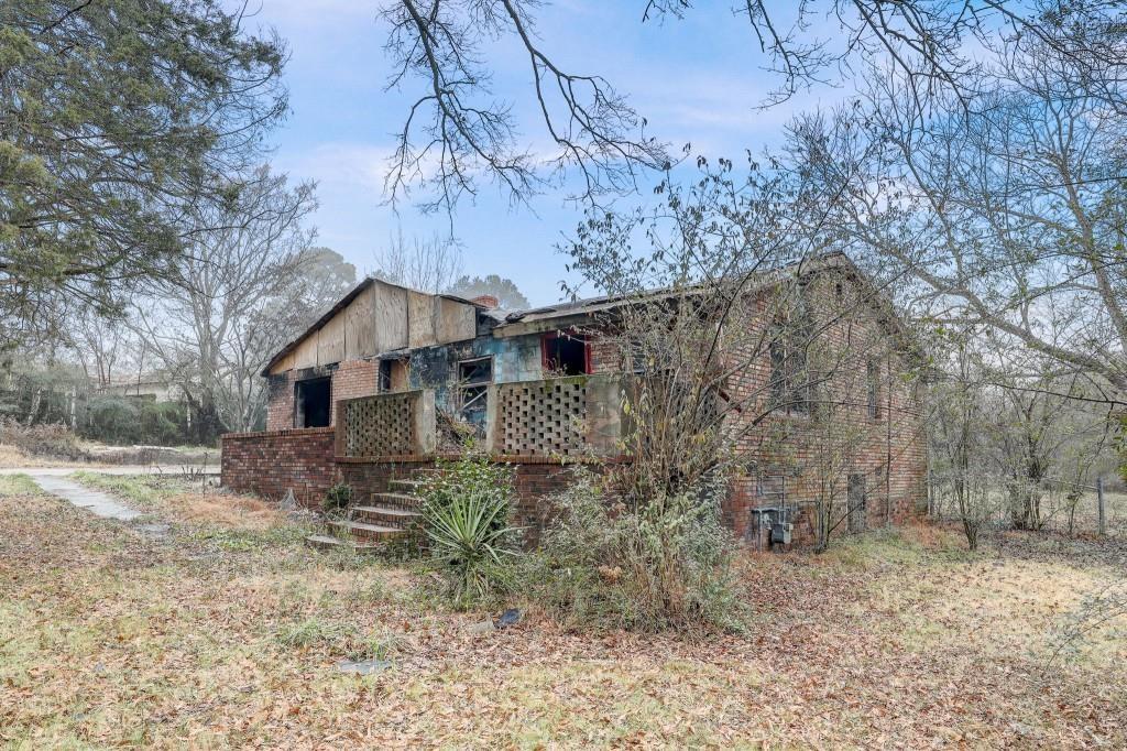 2636 Old Toney Road Ellenwood, GA 30294 - Photo 16 of 16 a view of a house with a yard