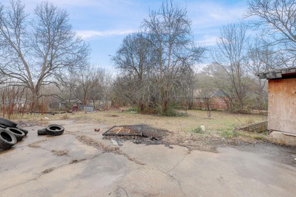2636 Old Toney Road Ellenwood, GA 30294 - Photo 2 of 16 a view of a yard covered with snow