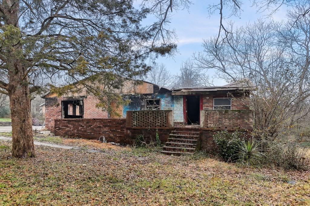 2636 Old Toney Road Ellenwood, GA 30294 - Photo 3 of 16 a view of a house with a yard