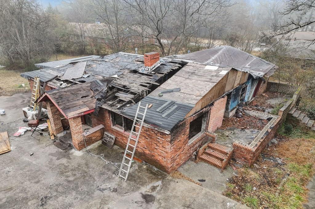 2636 Old Toney Road Ellenwood, GA 30294 - Photo 4 of 16 an aerial view of a house with a yard