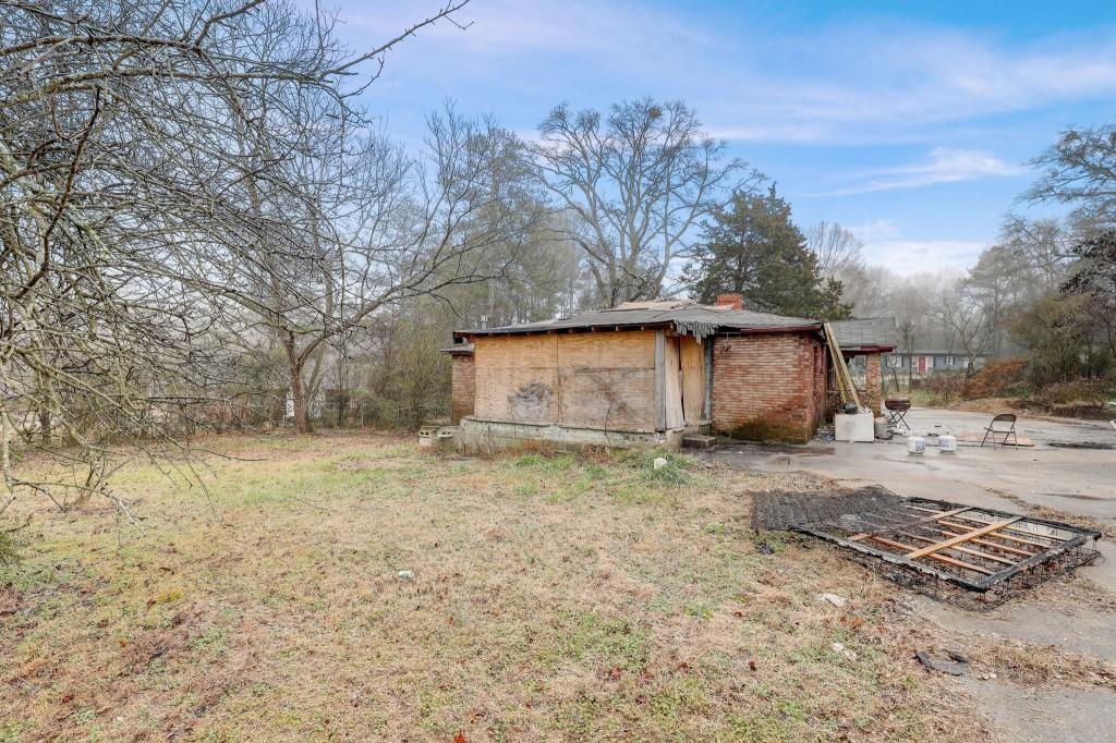 2636 Old Toney Road Ellenwood, GA 30294 - Photo 8 of 16 a view of a house with a outdoor space