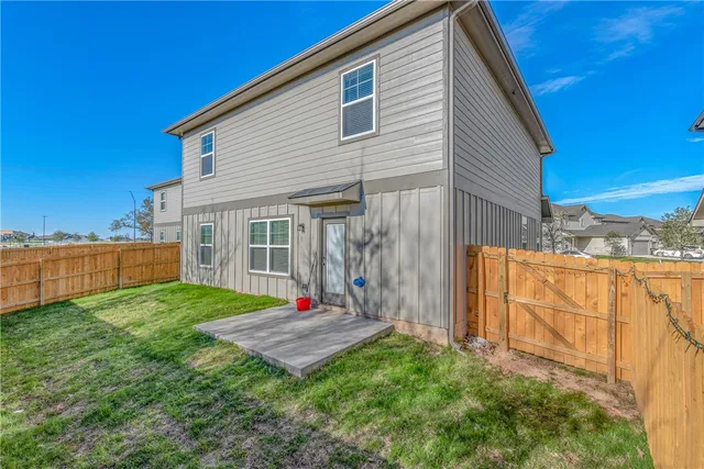 a view of a backyard with a garden