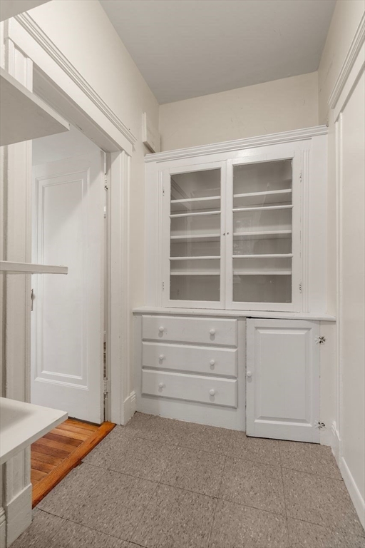 441 Washington Street, Unit 2 Brookline, MA 02446 - Photo 13 of 28 a bedroom with a bed and a window