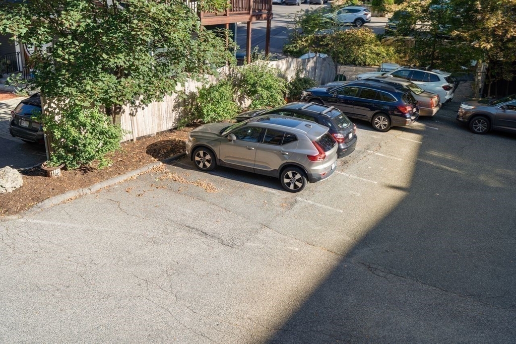 441 Washington Street, Unit 2 Brookline, MA 02446 - Photo 26 of 28 a view of cars parked in a parking lot