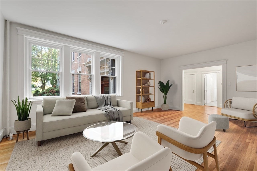 441 Washington Street, Unit 2 Brookline, MA 02446 - Photo 3 of 28 a living room with furniture and a large window