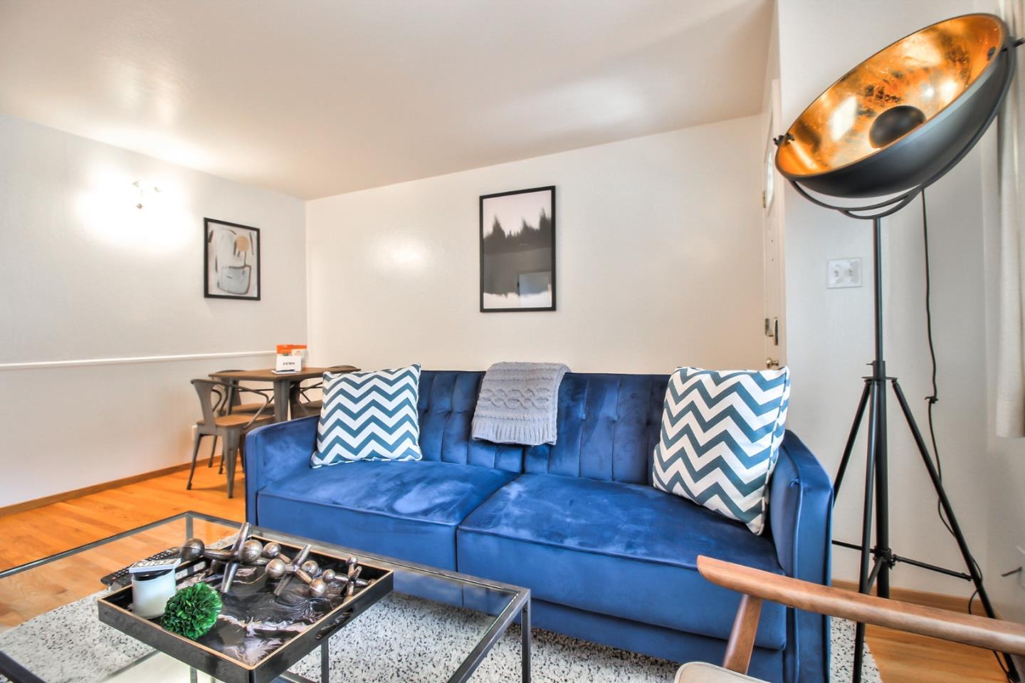 184 Centre Street Mountain View, CA 94041 - Photo 12 of 22 a living room with furniture and a rug