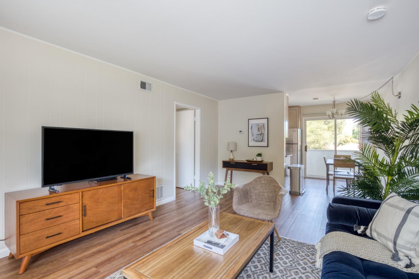 184 Centre Street Mountain View, CA 94041 - Photo 20 of 22 a living room with furniture and a flat screen tv
