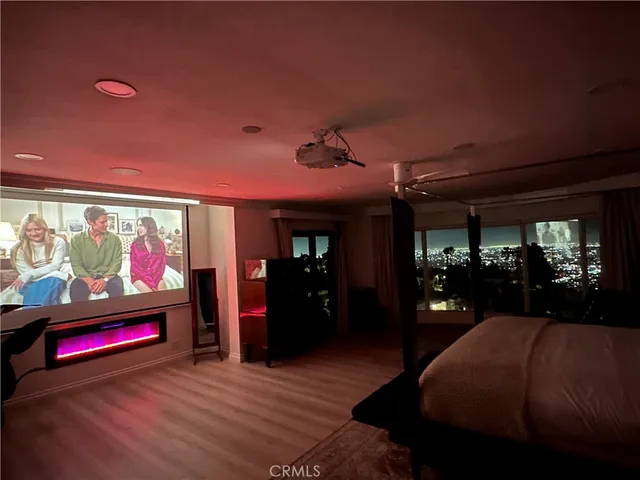 a bathroom with a sink a mirror and a shower