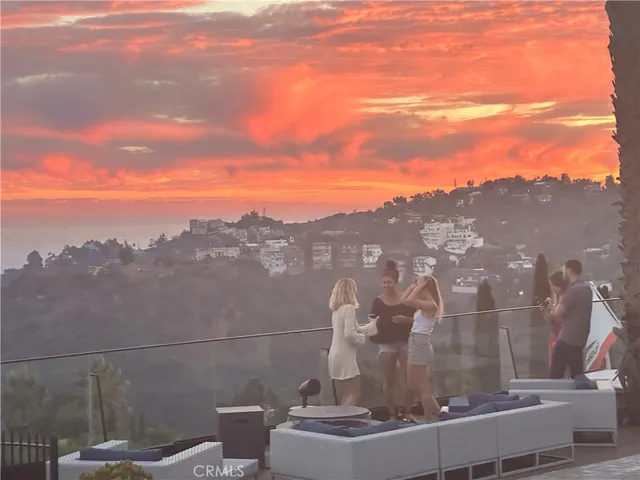 a living room with furniture fireplace and a flat screen tv