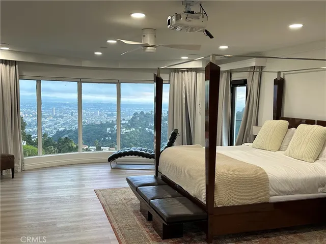 a bathroom with a sink a mirror and a shower