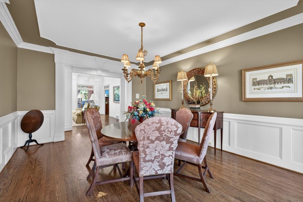 2761 Calloway Court Duluth, GA 30097 - Photo 12 of 124 a view of a dining room with furniture and wooden floor