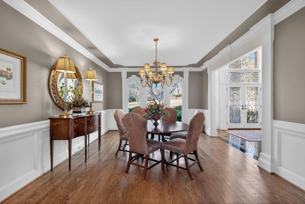2761 Calloway Court Duluth, GA 30097 - Photo 13 of 124 a view of a dining room with furniture window and wooden floor