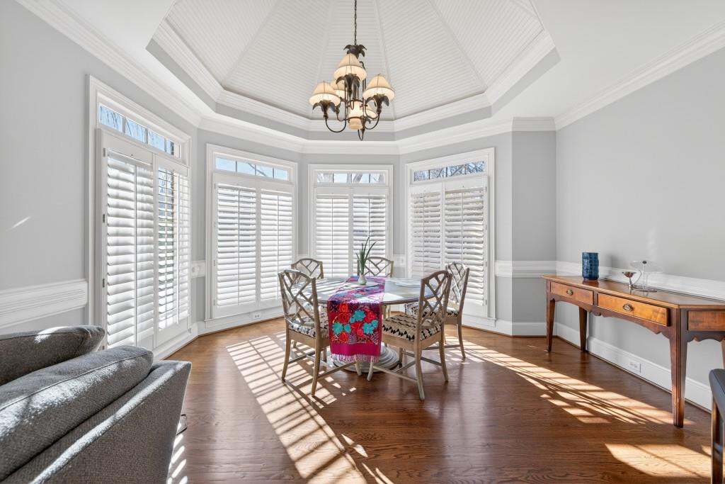 2761 Calloway Court Duluth, GA 30097 - Photo 30 of 124 a living room with furniture a window and a chandelier