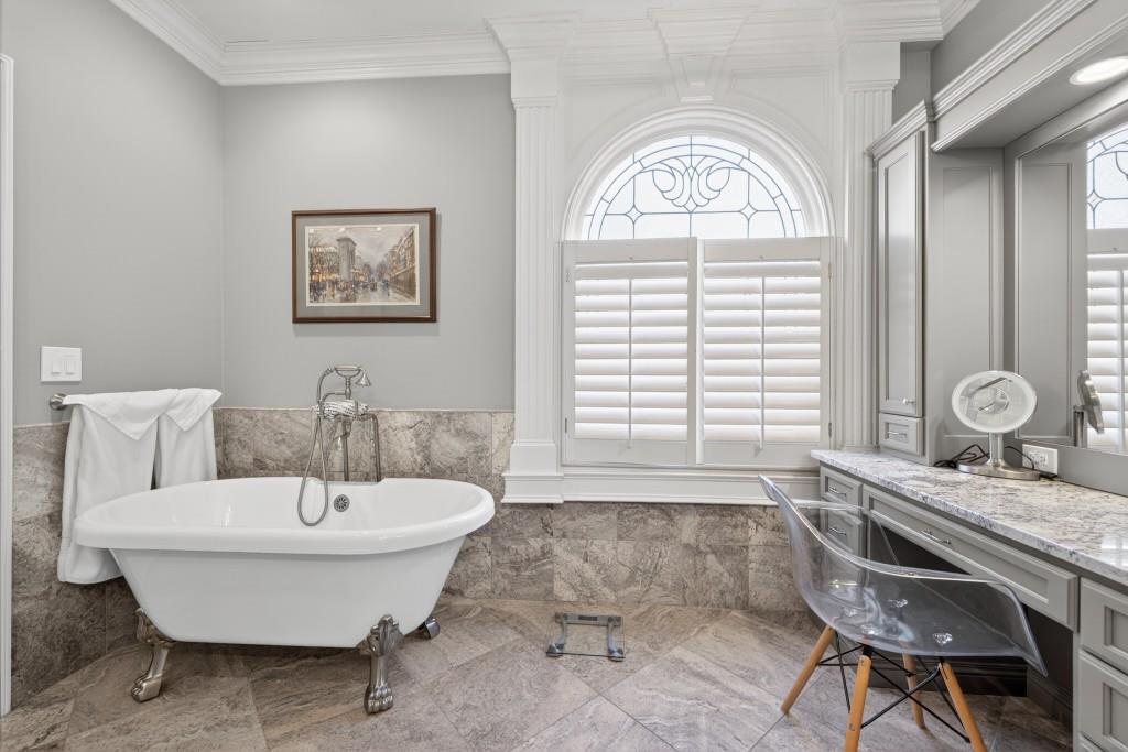 2761 Calloway Court Duluth, GA 30097 - Photo 44 of 124 a spacious bathroom with a bathtub and a sink