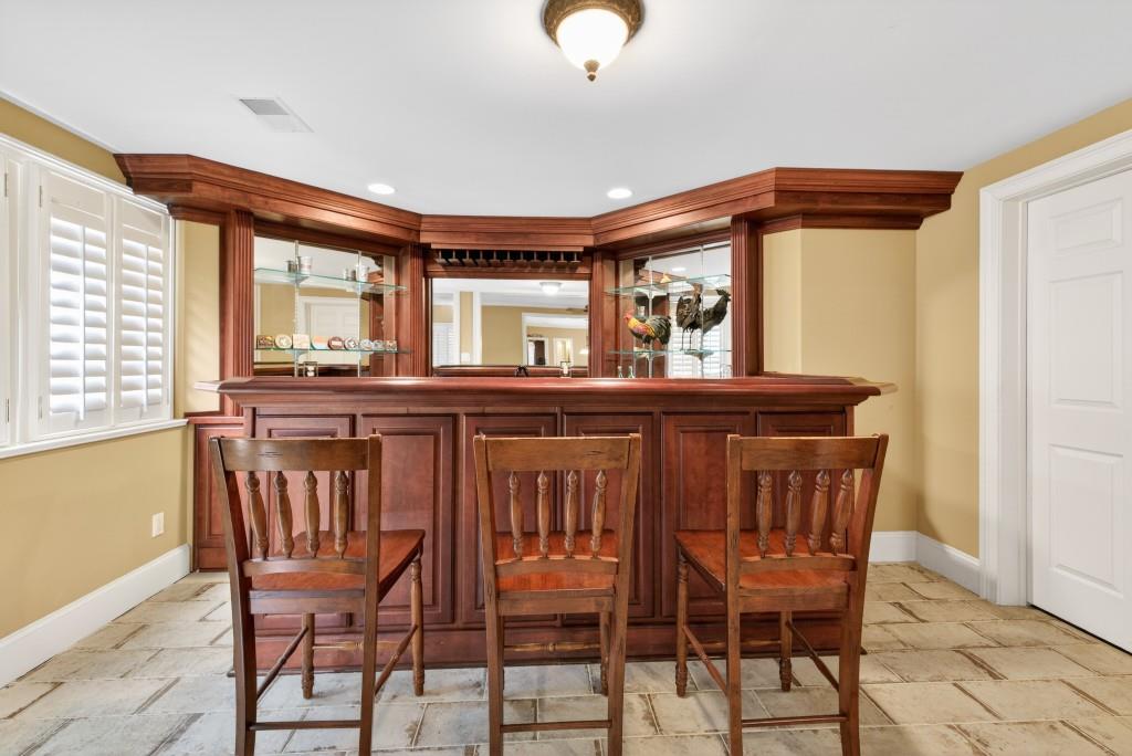 2761 Calloway Court Duluth, GA 30097 - Photo 70 of 124 a dining room with furniture and window