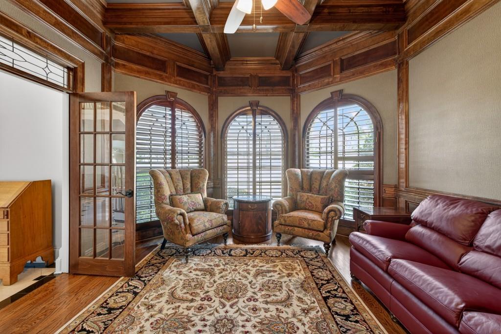 2761 Calloway Court Duluth, GA 30097 - Photo 10 of 124 a living room with furniture and a flat screen tv