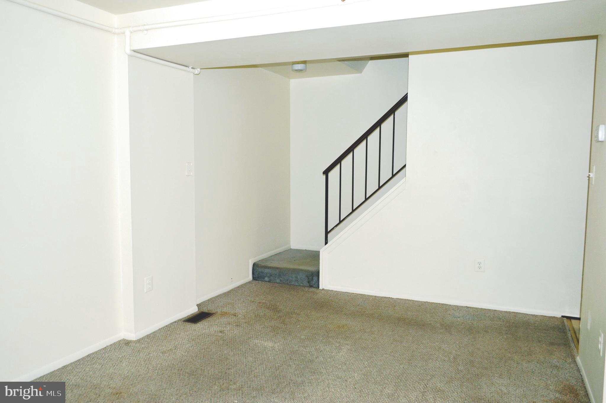 4801 Berwyn House Road, Unit A4801 College Park, MD 20740 - Photo 5 of 22 Dining off the Living Area. Stairs to upper level