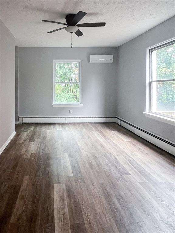 49 North Linwood Avenue Pittsburgh, PA 15205 - Photo 15 of 17 wooden floor in an empty room with a window